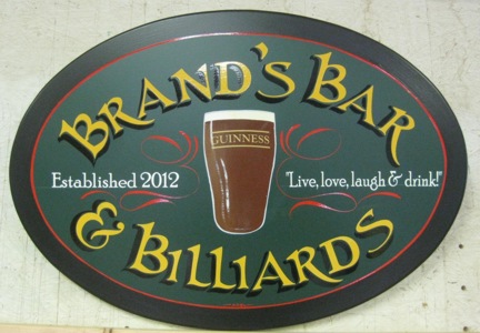 This wooden pub sign was custom made for someone's personal bar.