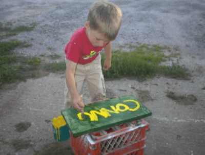 Our little guy, Connor, at 6 years, already lettering signs!