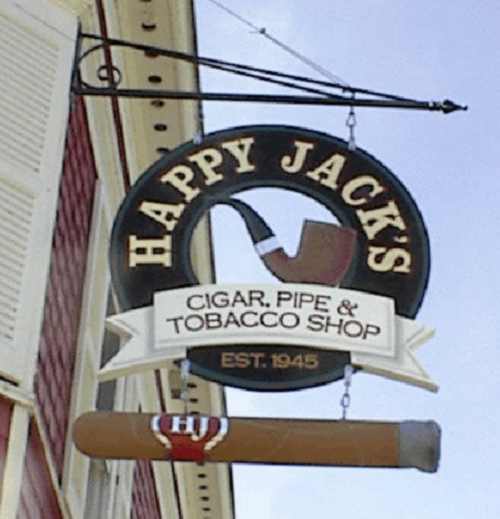 A 6' long cigar accents this 23k gold sign!